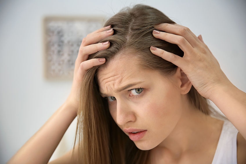 دلایل ریزش مو در زنان چیست